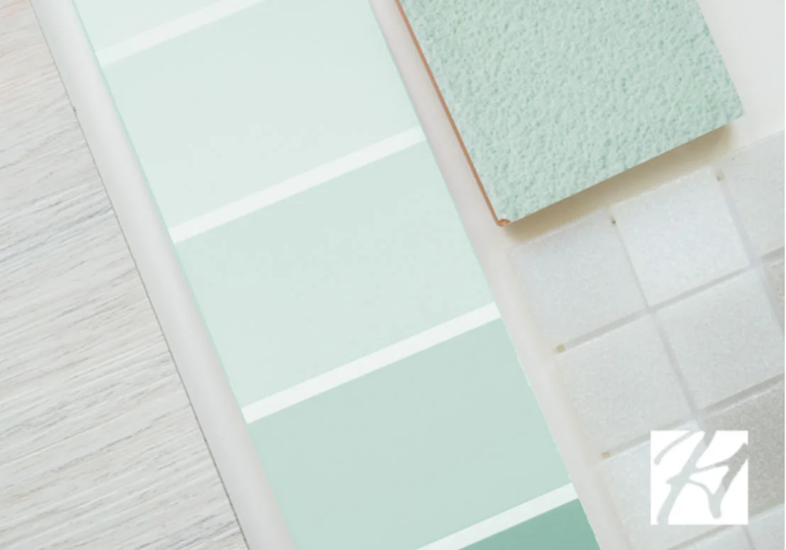 Green paint swatches, textured green sample, and square tiles for home builder design inspiration.