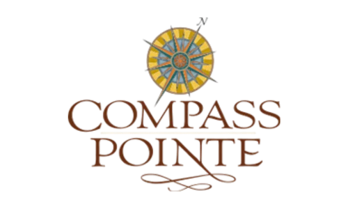 Compass Pointe logo featuring a decorative compass rose above the text, likely related to home builder branding.