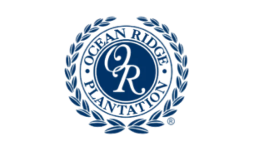 Blue laurel wreath encircling the letters "OR" with "Ocean Ridge Plantation" text, possibly representing a home builder.